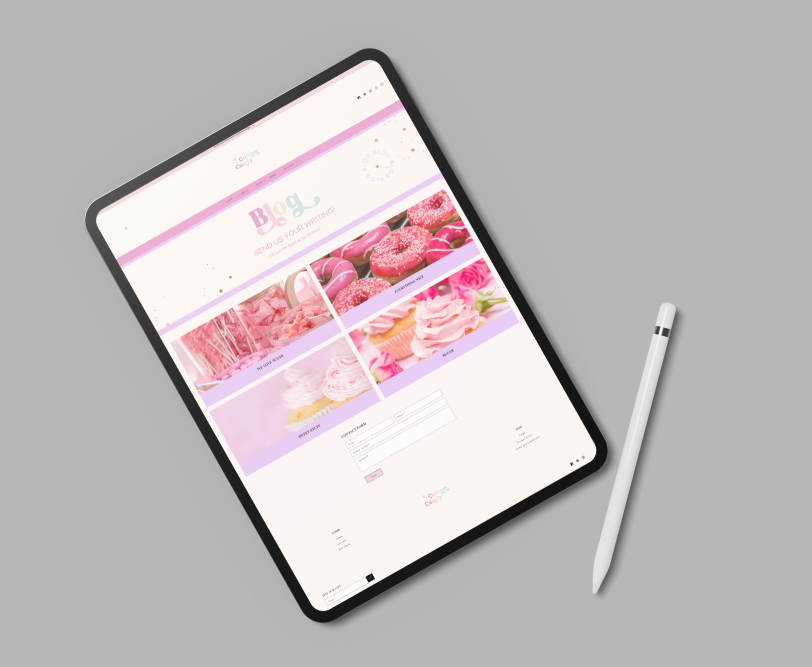 Tablet displaying a floral website on a gray background with a stylus pen beside it