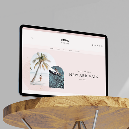 Emme Shopify website template tablet 
mockup on table